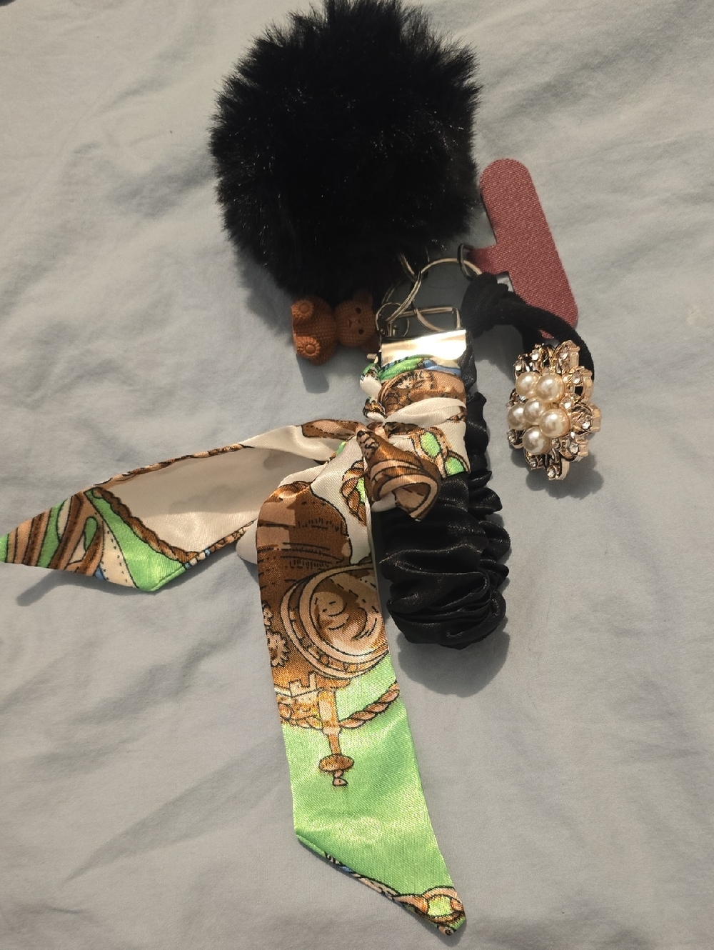 Decorative Black Pom-Pom Keychain and Green Scarf Twilly Phone Purse Wristlet